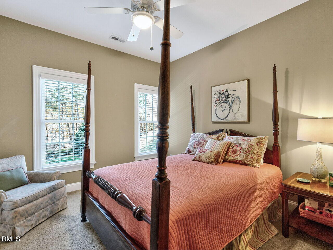 10312 Old Creedmoor Road Raleigh, NC 27613 - Photo 23 of 40 a bedroom with a bed a couch and a window