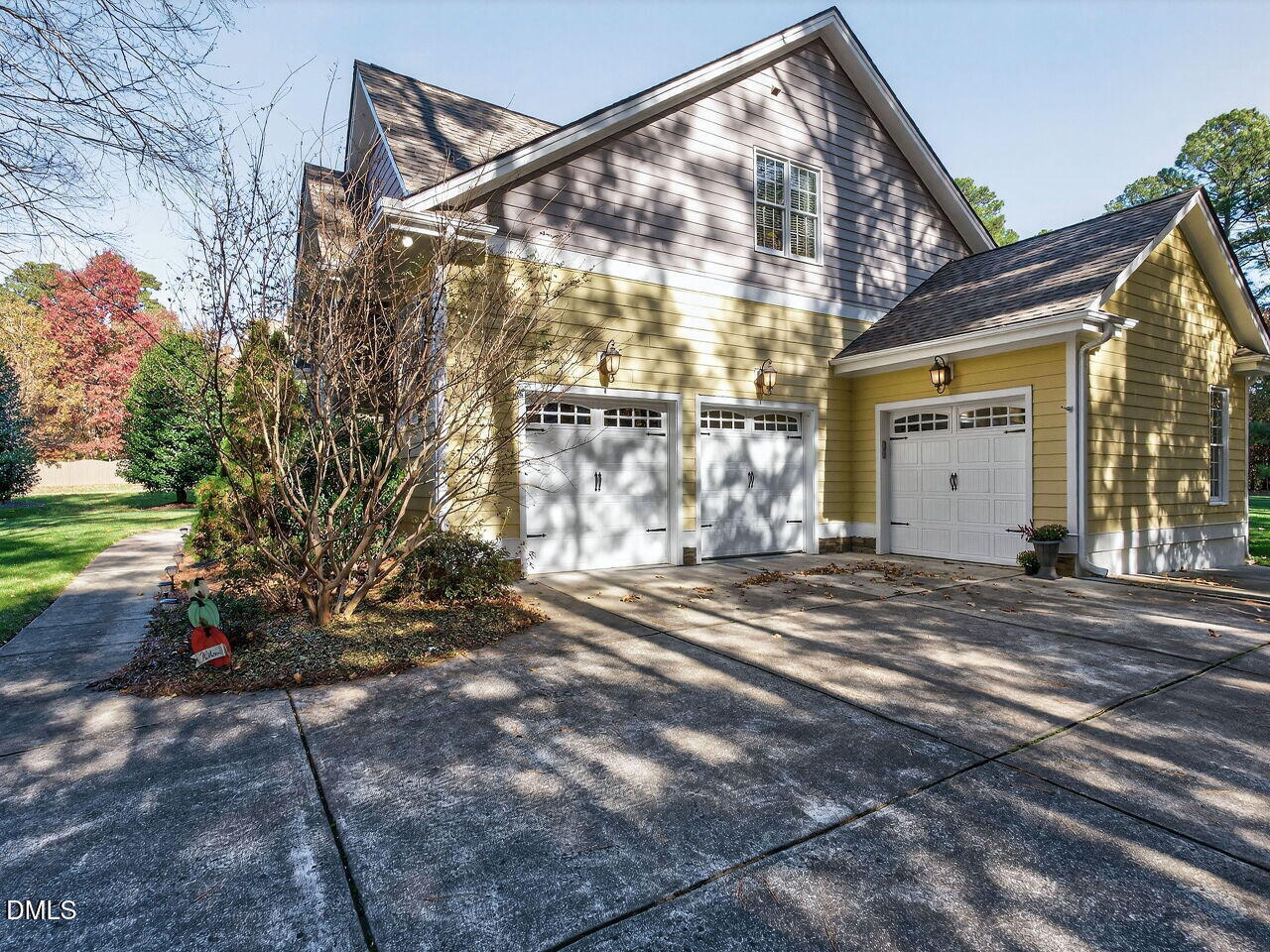 10312 Old Creedmoor Road Raleigh, NC 27613 - Photo 37 of 40 a view of a house with a yard and garage