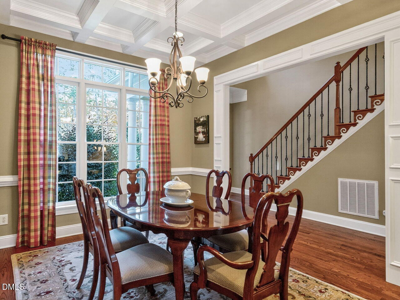 10312 Old Creedmoor Road Raleigh, NC 27613 - Photo 7 of 40 a view of a dining room with furniture window and wooden floor