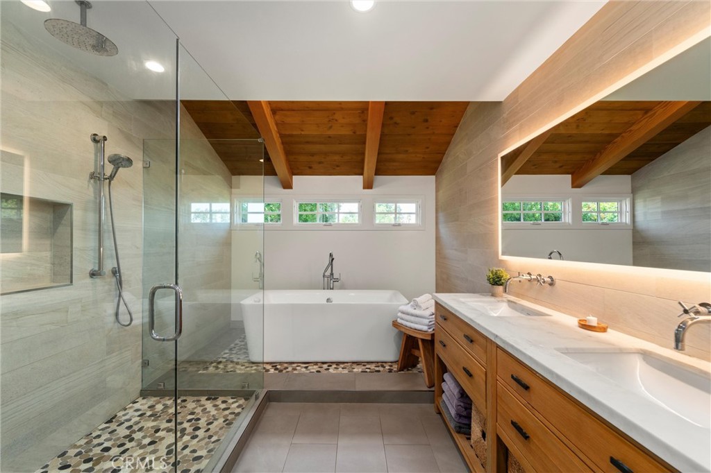 7337 La Soldadera Rancho Santa Fe, CA 92067 - Photo 34 of 60 a bathroom with a tub sink and window