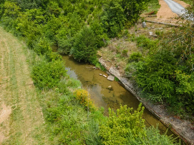 a view of a backyard of a house