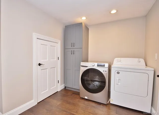 a view of a storage & utility room with washer and dryer