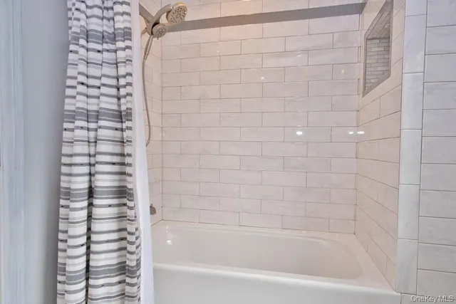 a bathroom with a bathtub