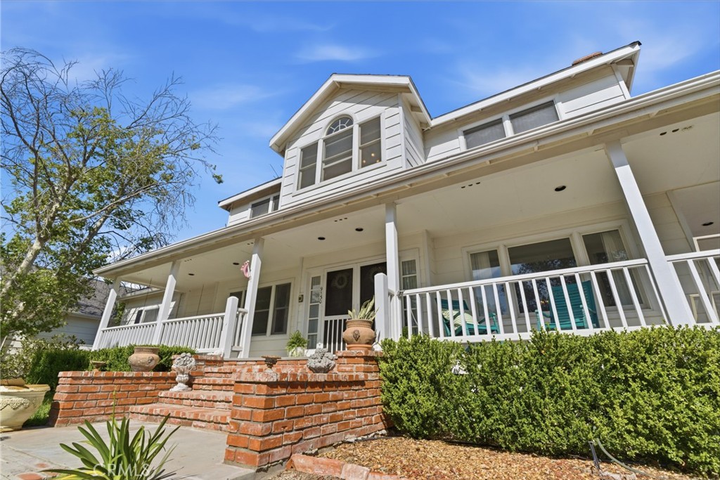 9130 Old Stage Road Agua Dulce, CA 91390 - Photo 1 of 74 a front view of a house with garden