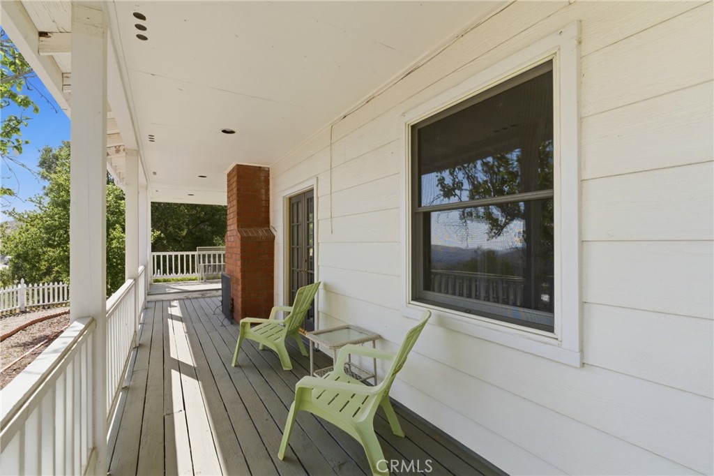 9130 Old Stage Road Agua Dulce, CA 91390 - Photo 15 of 74 a view of a balcony with chairs