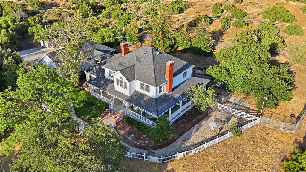 9130 Old Stage Road Agua Dulce, CA 91390 - Photo 7 of 74 an aerial view of a house with a yard