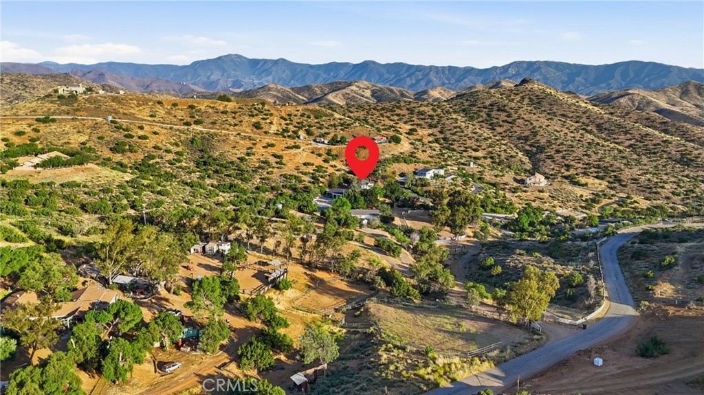 9130 Old Stage Road Agua Dulce, CA 91390 - Photo 72 of 74 a view of a lush green hillside and houses