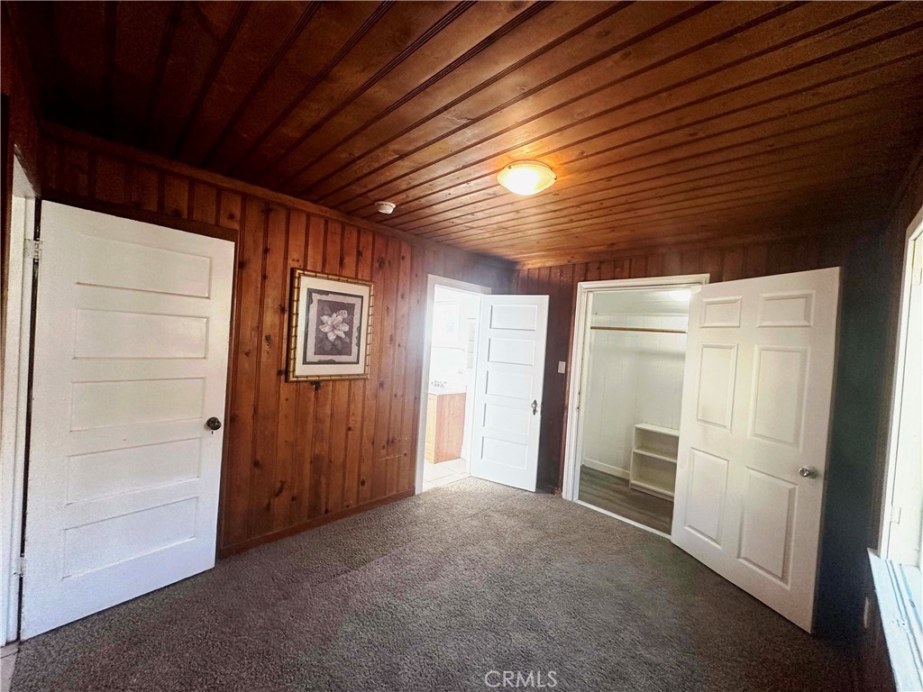 505 North Drive Lebec, CA 93243 - Photo 15 of 34 a view of empty room with wooden walls