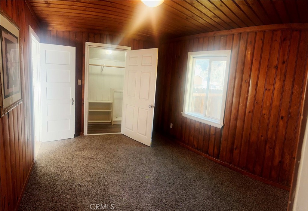 505 North Drive Lebec, CA 93243 - Photo 16 of 34 an empty room with closet and windows