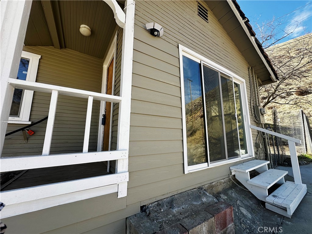 505 North Drive Lebec, CA 93243 - Photo 27 of 34 a view of wooden house with large windows