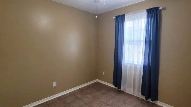 a large bathroom with a sink a large mirror and a shower
