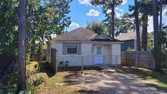 a house with trees in the background