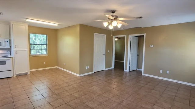 a kitchen with a cabinets and appliances