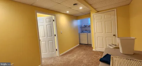 a view of a chair and table in the balcony