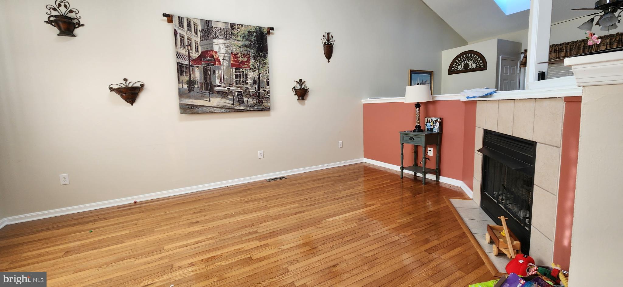 17010 Minos Conaway Road Lewes, DE 19958 - Photo 4 of 28 a view of a room with wooden floor