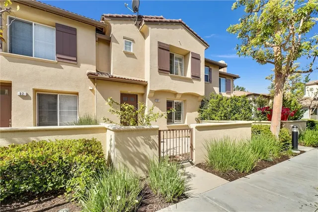 front view of a house with a small yard