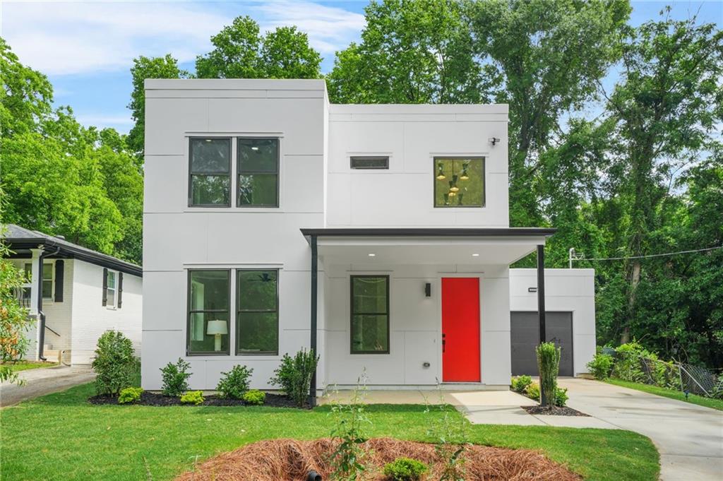 2926 5th Street Southwest Atlanta, GA 30315 - Photo 1 of 1 front view of a house with a yard