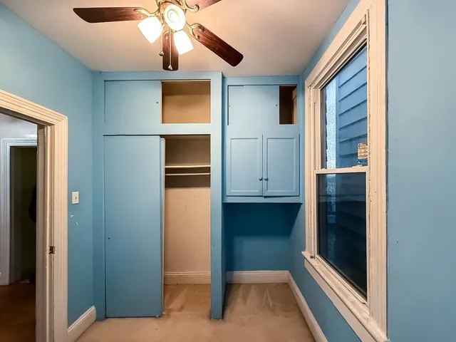 a view of livingroom with hardwood floor and hallway