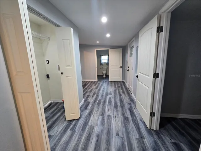 a utility room with cabinetry and dryer