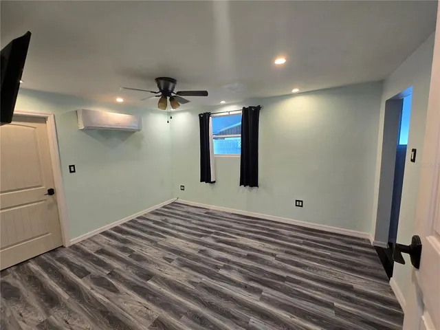 a view of a room with racks on the wall