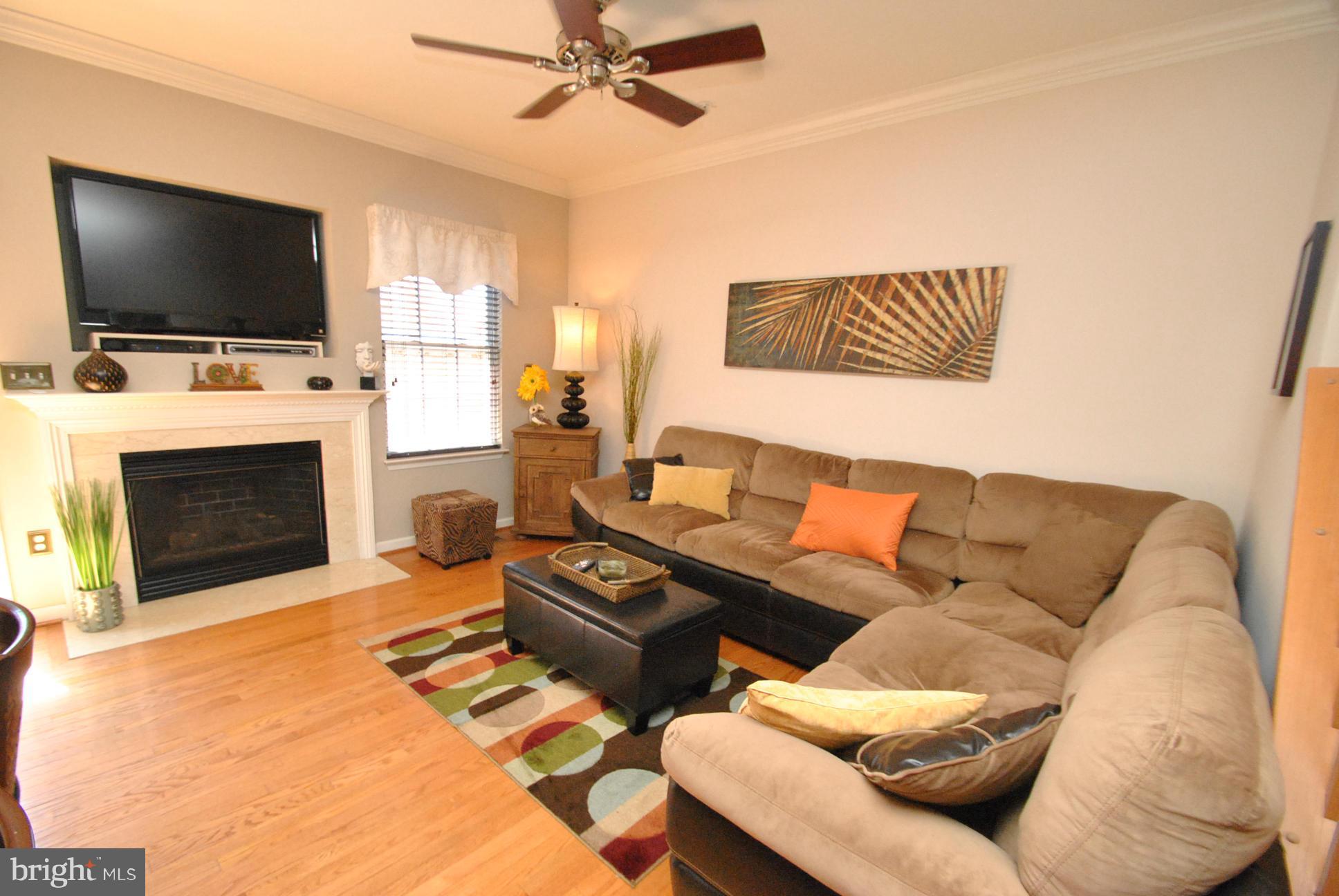 5037 Kemsley Road Baltimore, MD 21237 - Photo 12 of 30 FAMILY ROOM OFF KITCHEN W/GAS FIREPLACE
