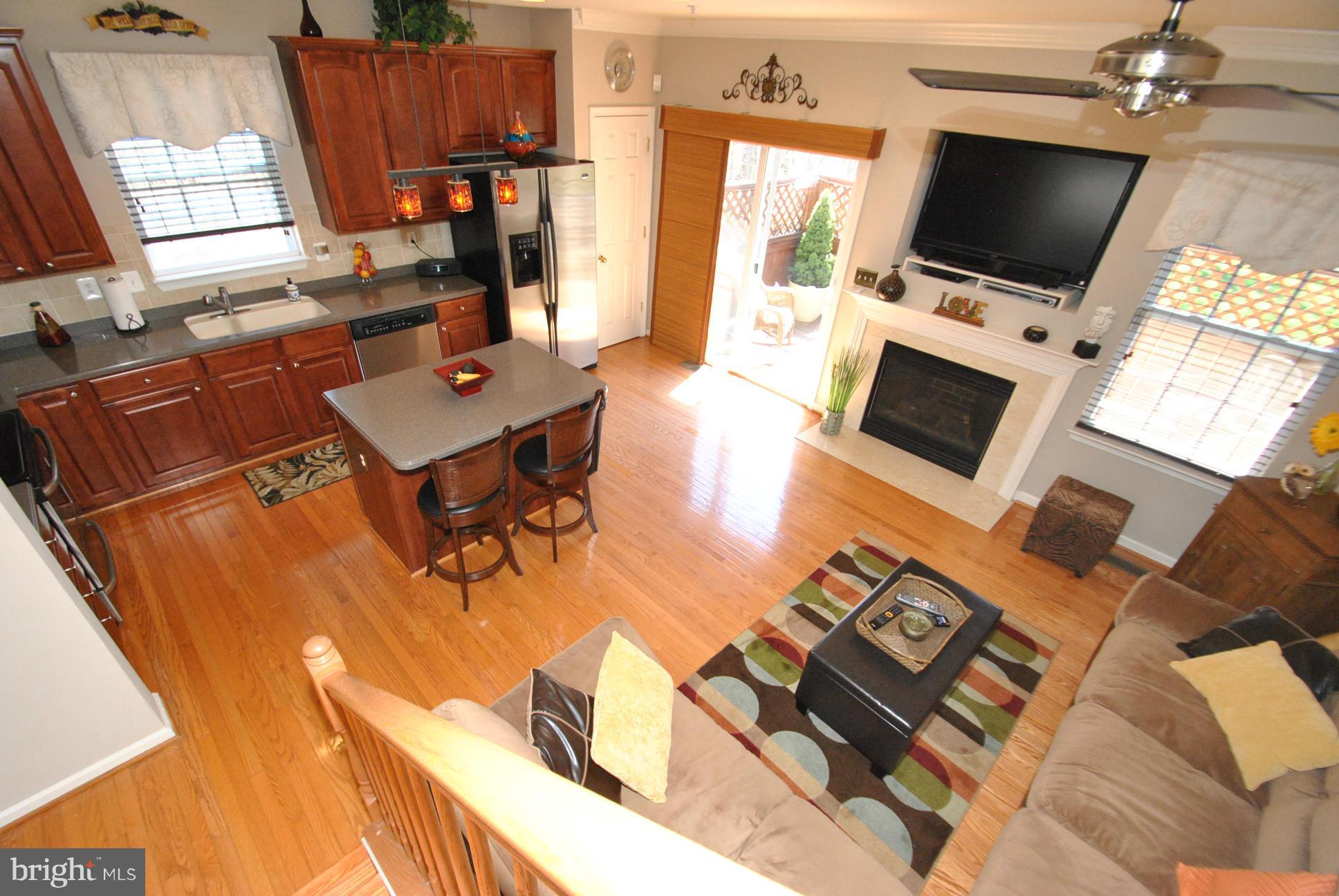 5037 Kemsley Road Baltimore, MD 21237 - Photo 30 of 30 VIEW OF KITCHEN & FAMILY ROOM - OPEN FLOORPLAN