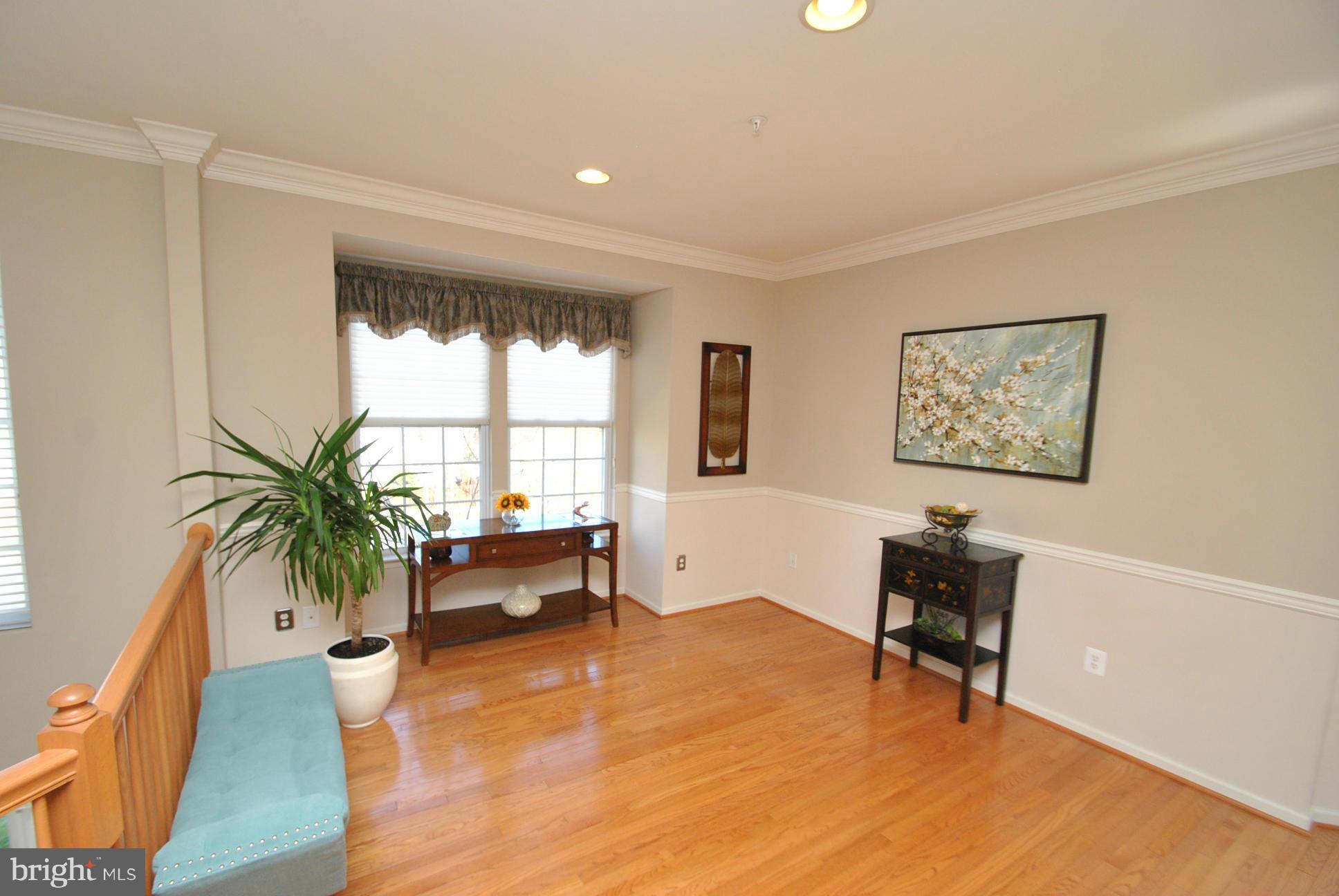 5037 Kemsley Road Baltimore, MD 21237 - Photo 4 of 30 GORGEOUS HARDWOOD FLOORS & CROWN MOLDING THRUOUT