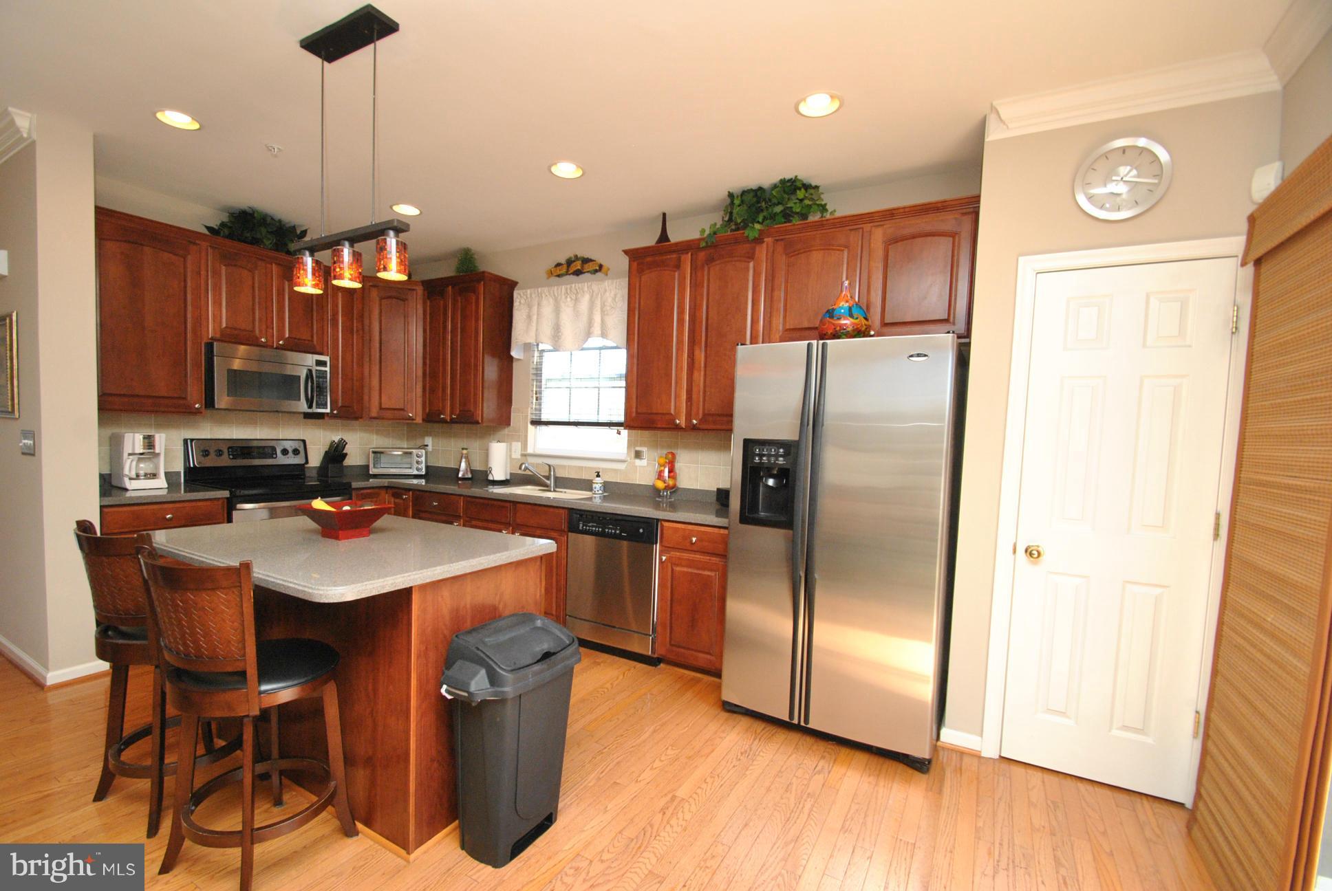 5037 Kemsley Road Baltimore, MD 21237 - Photo 10 of 30 CUSTOM LIGHTING, BREAKFAST BAR & MORE