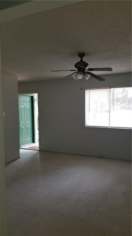 6207 Adalee Avenue, Unit B Austin, TX 78723 - Photo 3 of 11 a view of a livingroom with a ceiling fan and window
