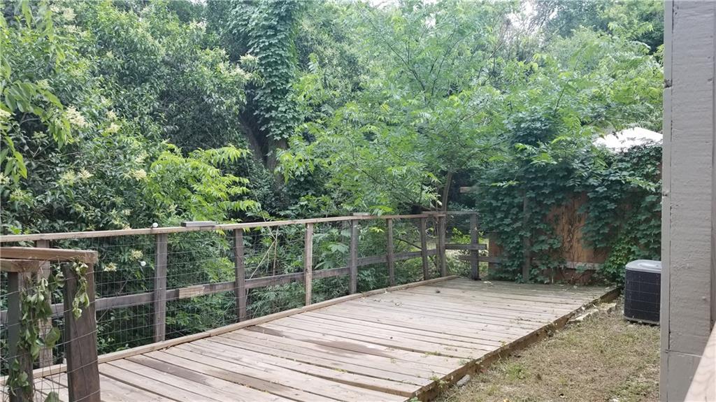 6207 Adalee Avenue, Unit B Austin, TX 78723 - Photo 10 of 11 a view of outdoor space with deck and yard
