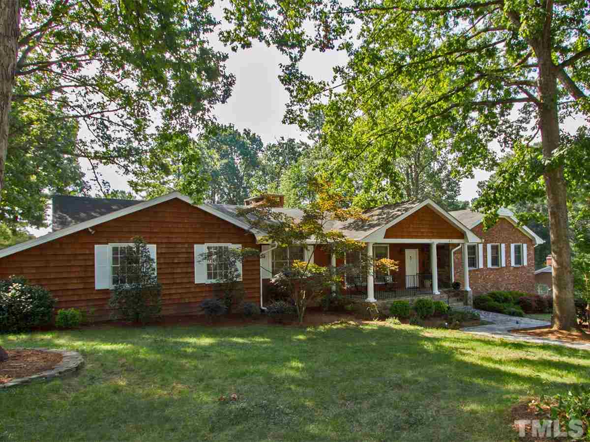 401 Sampson Street Raleigh, NC 27609 - Photo 1 of 25 a front view of a house with a garden