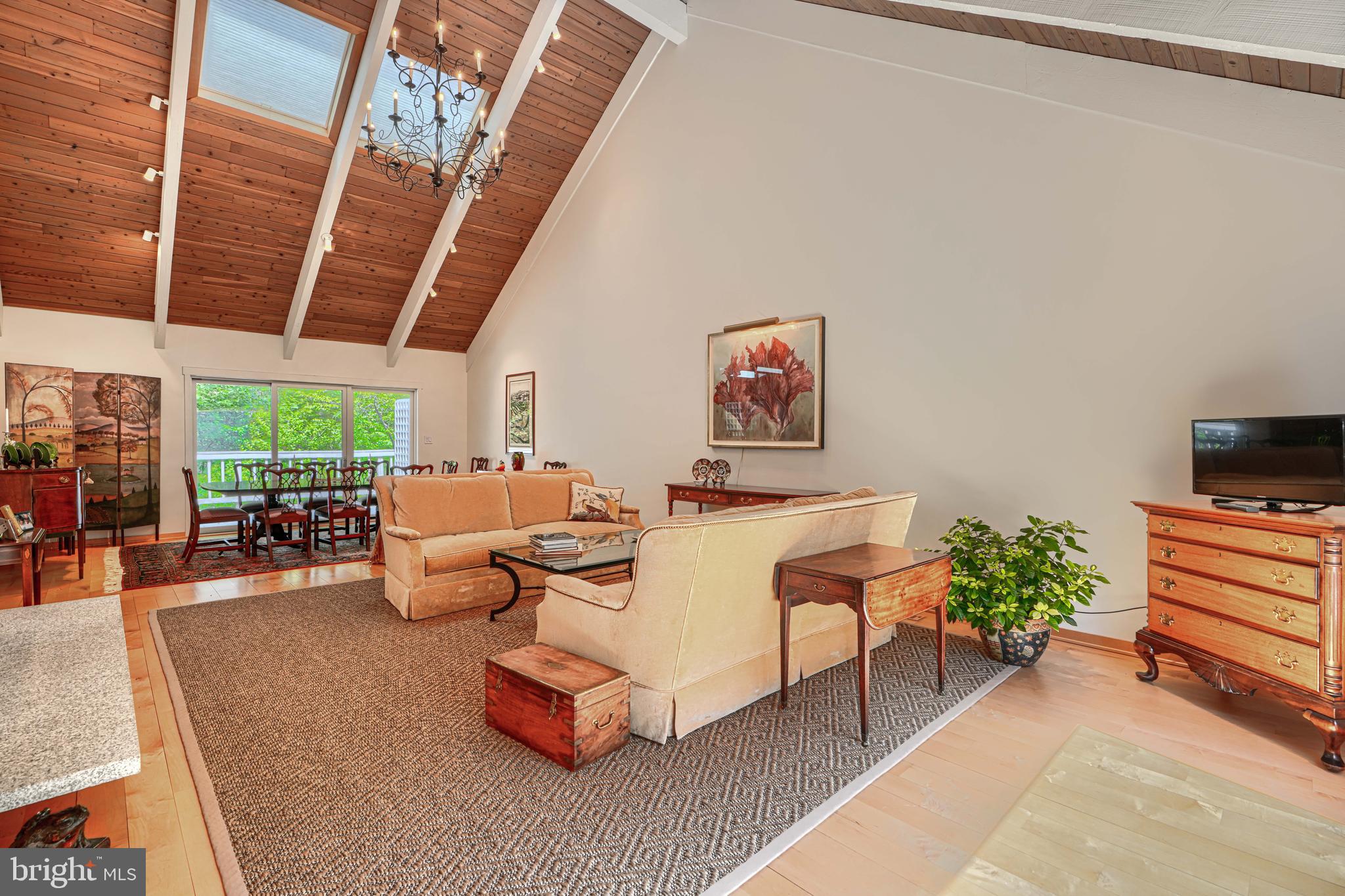 2504 Stone Mill Road Baltimore, MD 21208 - Photo 23 of 123 Spacious living room with wood beams and skylights