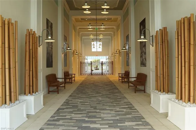 a view of a swimming pool with a table and chairs