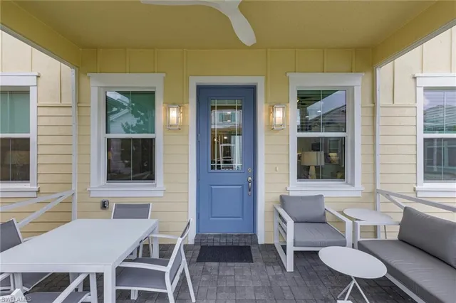 a outdoor space with a couch and chairs