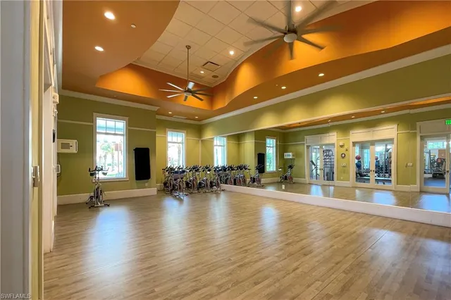 a view of a room with lots of wooden furniture