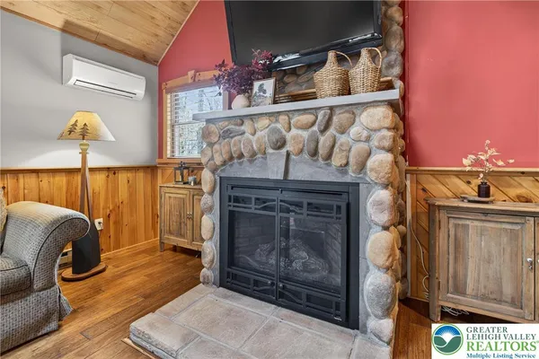 a kitchen with stainless steel appliances granite countertop a refrigerator a stove top oven a sink and dishwasher