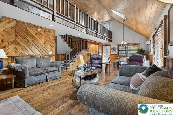 a kitchen with stainless steel appliances granite countertop a stove and a refrigerator