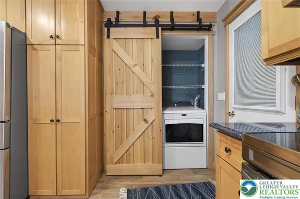 a bedroom with a bed and a table in it