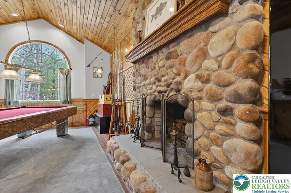 a very nice looking room with a ceiling fan