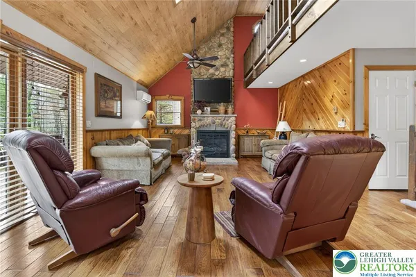 a view of a chairs and a table in the patio