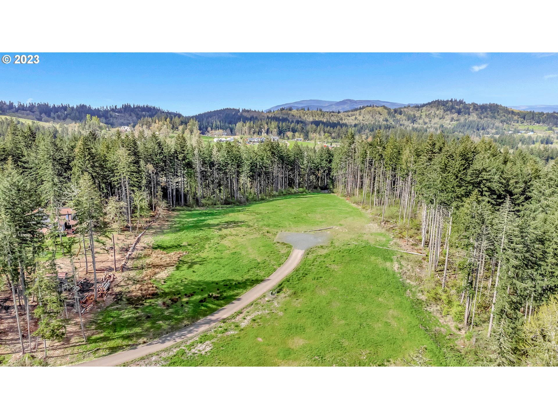 Spring Boulevard Eugene, OR 97405 - Photo 24 of 34 a open area with mountains in the background