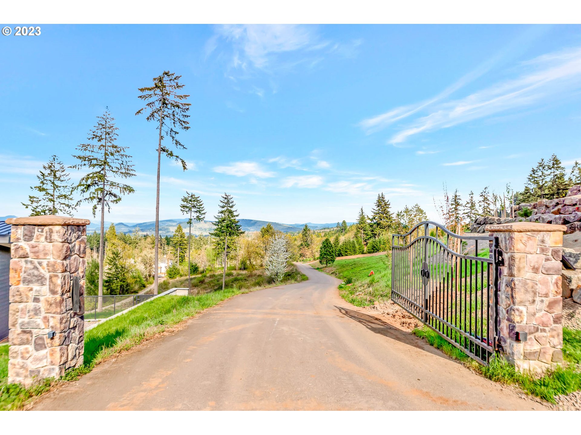 Spring Boulevard Eugene, OR 97405 - Photo 4 of 34 a view of a pathway with a wrought fence