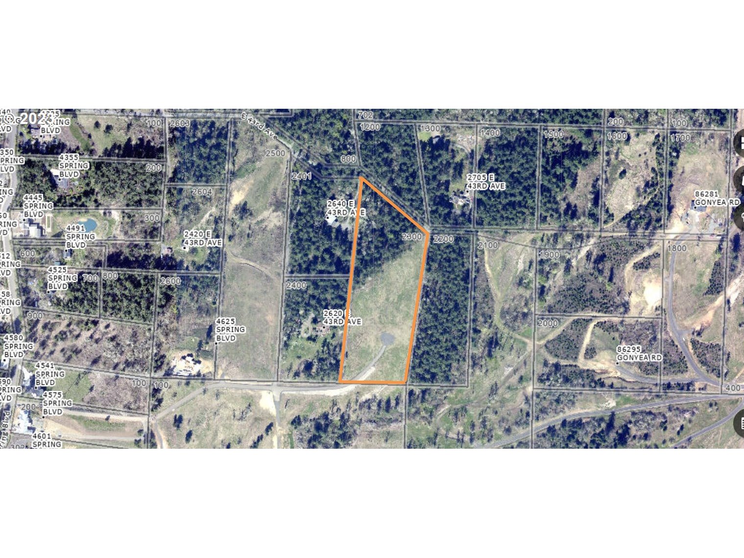 Spring Boulevard Eugene, OR 97405 - Photo 7 of 34 a view of a yard