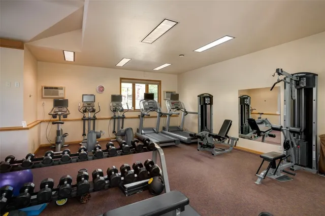a view of a room with gym equipment