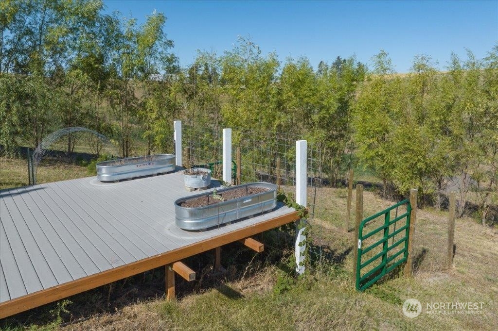 8921 West Jensen Road Cheney, WA 99004 - Photo 34 of 40 a view of a roof deck with couches