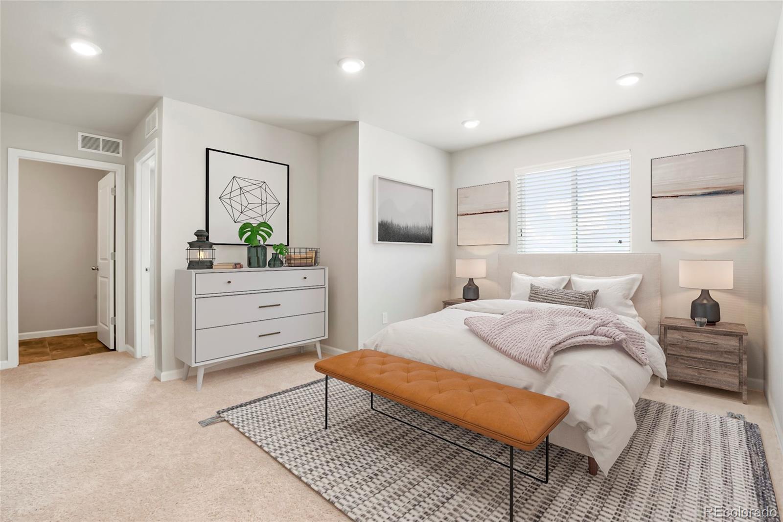 1843 Homestead Drive Fort Lupton, CO 80621 - Photo 6 of 33 a bedroom with a bed and a dresser
