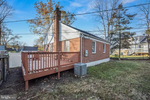 a view of a yard with a fence