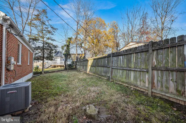 a view of backyard with green space