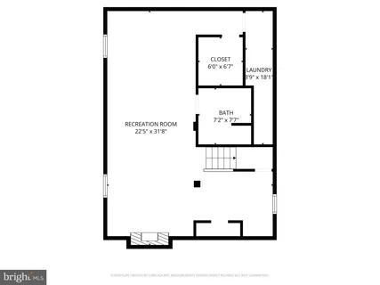 a picture of a bench in front of a wall