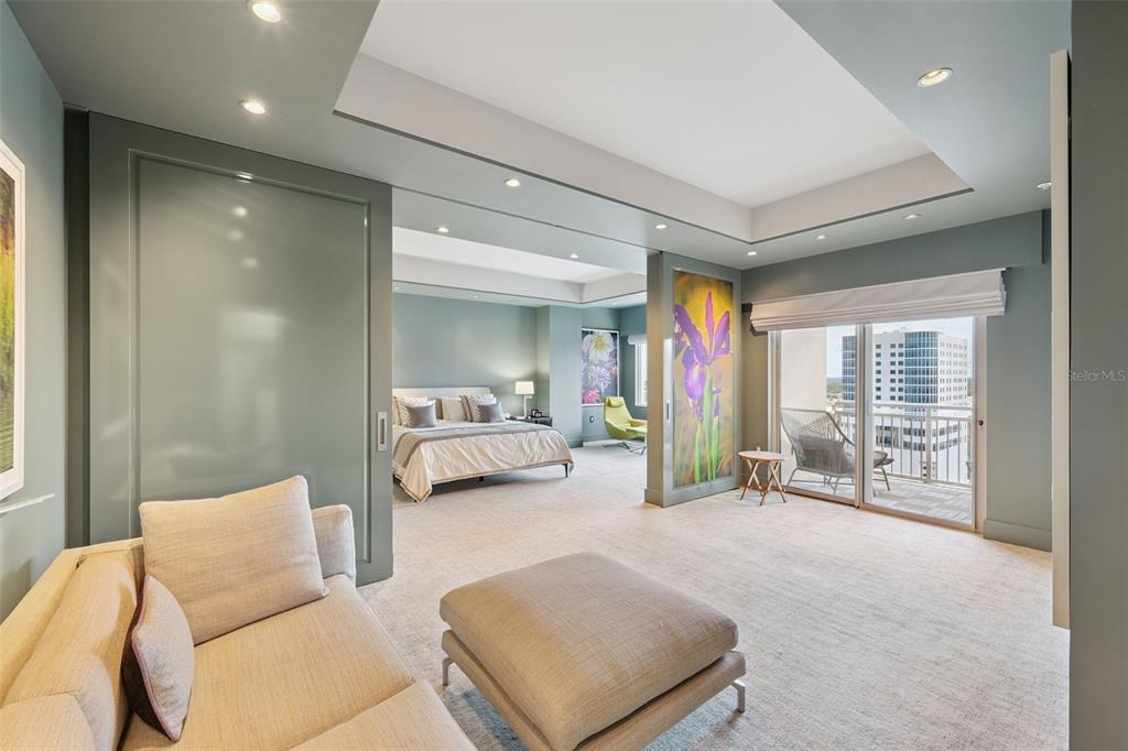 1111 Ritz Carlton Drive, Unit 1704 Sarasota, FL 34236 - Photo 12 of 53 a living room with furniture and a large window
